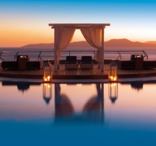 Grand Hotel Mykonos pool at sunset